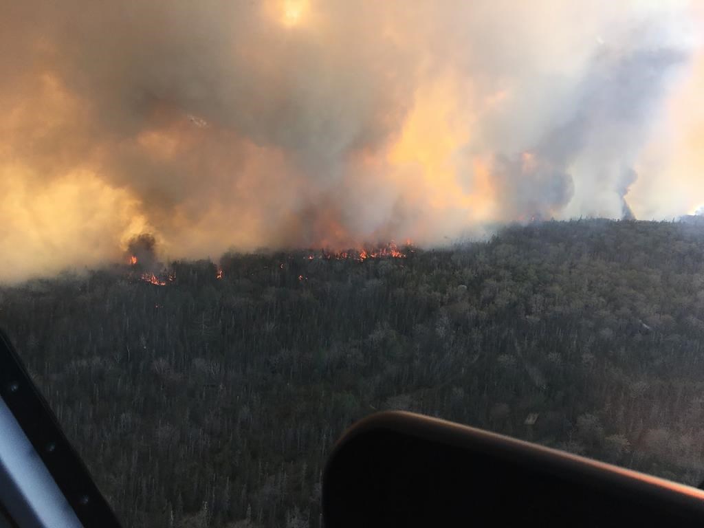 The wildfire at Barrington Lake, Shelburne Co. Nova Scotia, shown in this hand-out image, escaped containment last night and has grown to about 17,600 hectares. Hot, dry and windy conditions are making fire suppression challenging.