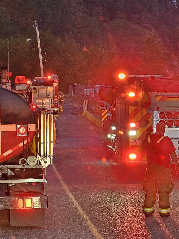 Port McNeill Fire Rescue on the scene of the fire at the world's largest burl, which was badly burned in a fire.