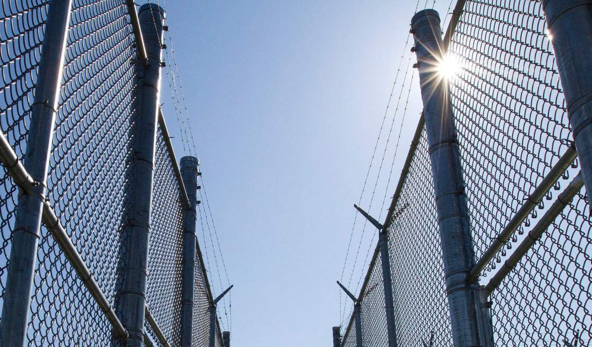 A new report by Ontario's chief coroner says urgent action is needed to fix rapidly deteriorating systemic issues within correctional facilities across the province after the number of inmates that died in custody almost doubled in recent years. Fences with razor wire are shown at Collins Bay Institution in Kingston, Ont., on Tuesday, May 10, 2016. THE CANADIAN/Lars Hagberg.