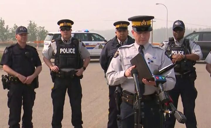RCMP speak at a news conference in Valleyview, Alta., on May 17, 2023.