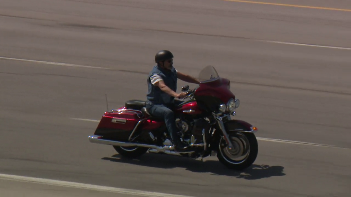 A motorcyclist riding down a highway in Calgary. The Calgary Police Service is promoting motorcycle safety as the weather warms up and the riding season starts.