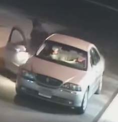 The vehicle in which three individuals fled in after the theft.