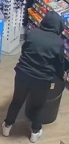 Surveillance image of a suspect in the theft.