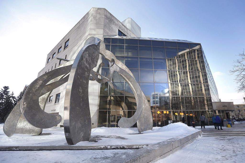 People enter the Law Courts in Winnipeg on Monday, Feb. 5, 2018. Two Manitoba Provincial Court judges were appointed to the Court of Kings Bench this month. THE CANADIAN PRESS/John Woods.