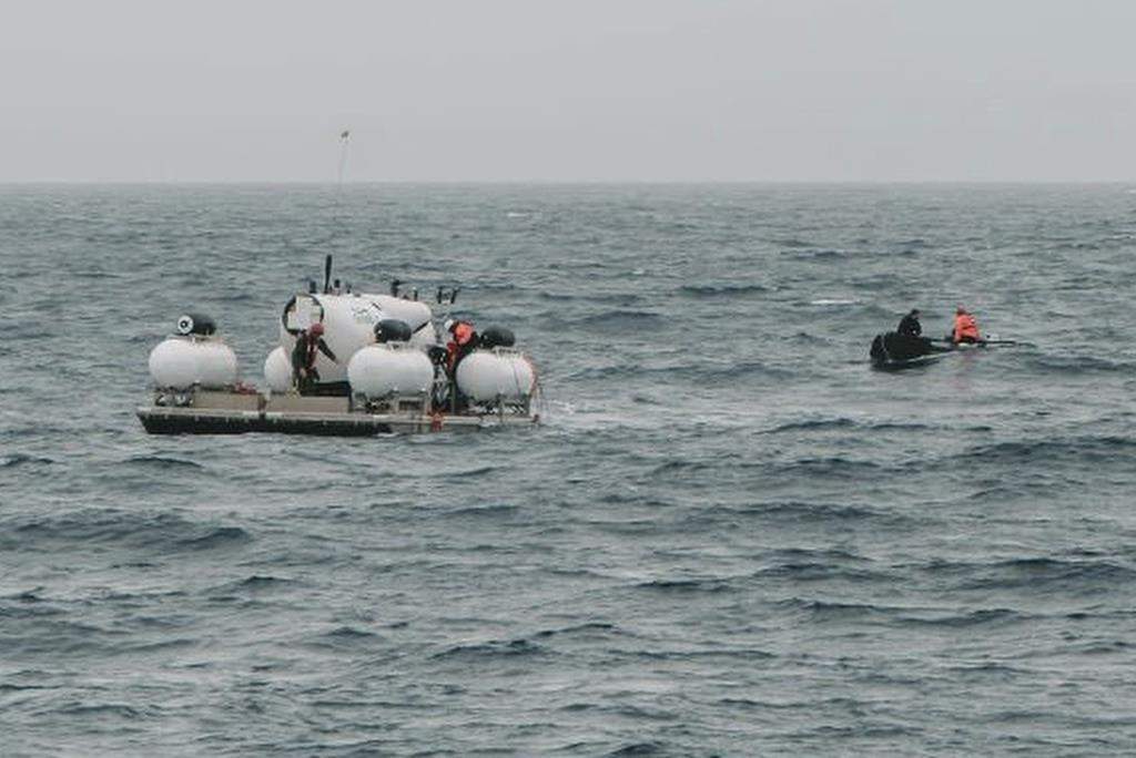In this photograph released by Action Aviation, the submersible Titan is set to dive into the Atlantic Ocean on an expedition to the Titanic on Sunday, June 18, 2023.