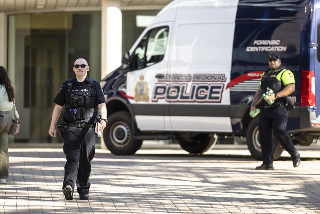 Members of Waterloo Regional Police investigate a stabbing at the University of Waterloo on Wednesday. Police said three victims were stabbed inside the university’s Hagey Hall, with one person taken into custody.