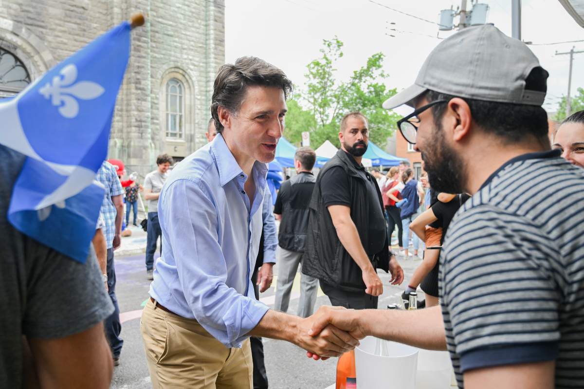 Prime Minister Justin Trudeau greets people during an event on Saint-Jean-Baptiste in Montreal, Saturday, June 24, 2023.