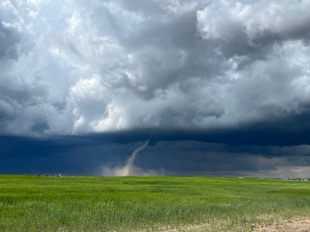 FILE: A funnel cloud near Iron Springs, Alta. on Jun. 14, 2023. 