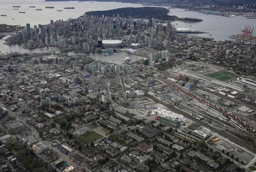 The downtown Vancouver skyline is seen in an aerial view from east Vancouver, on Saturday, April 9, 2022. 
