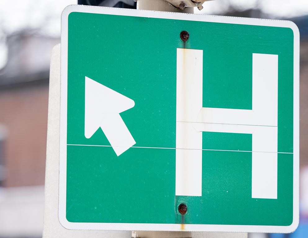 Island Health says a lack of staff has forced it to begin overnight closures of the emergency room at a small Victoria-area hospital. A sign for a hospital is shown in Montreal, Sunday, Feb. 6, 2022.