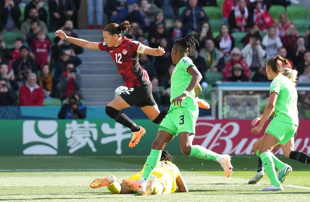 Canada’s Christine Sinclair competes for the ball against Nigeria during second half Group B soccer action at the FIFA Women’s World Cup in Melbourne, Australia, Friday, July 21, 2023.