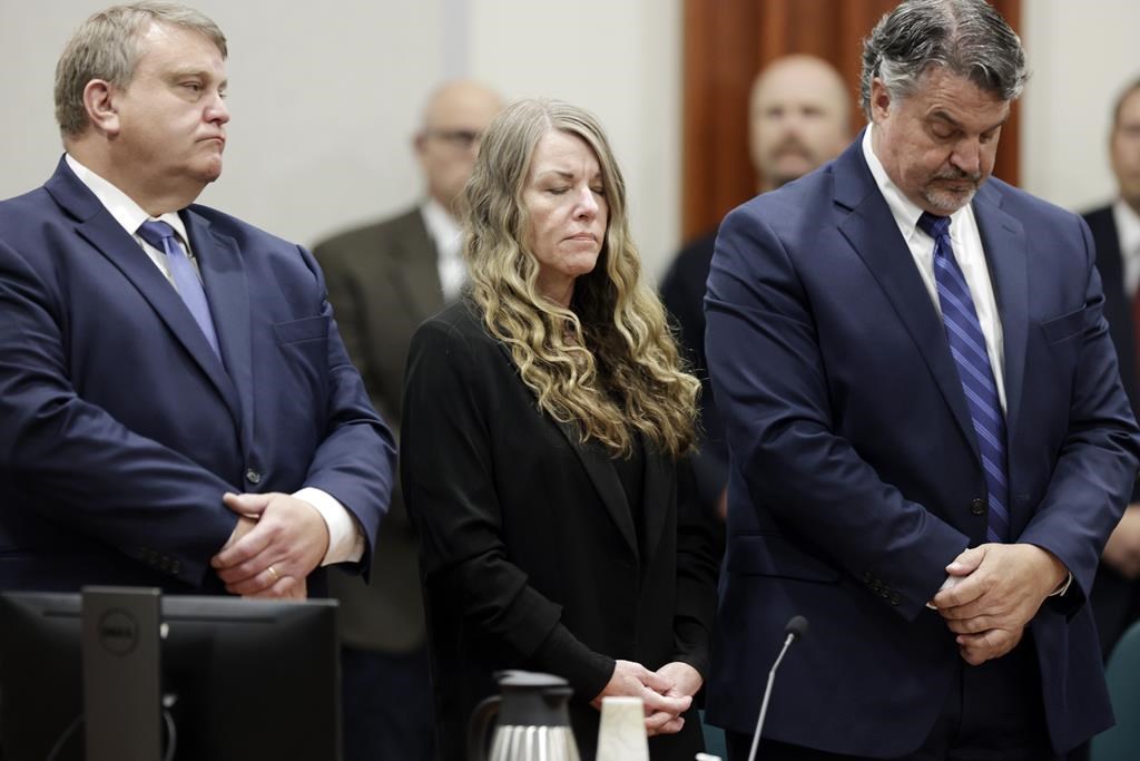 FILE - Lori Vallow Daybell stands and listens as the jury's verdict is read at the Ada County Courthouse in Boise, Idaho on Friday, May 12, 2023.