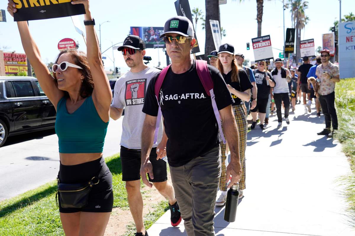 Actor Dermot Mulroney pickets.