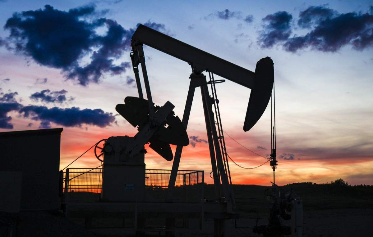 A pumpjack draws out oil from a well head near Calgary, Alta., Saturday, Sept. 17, 2022.  Canada's oil and gas sector is pointing to new government numbers that it says proves the industry can increase its production and lower emissions at the same time.