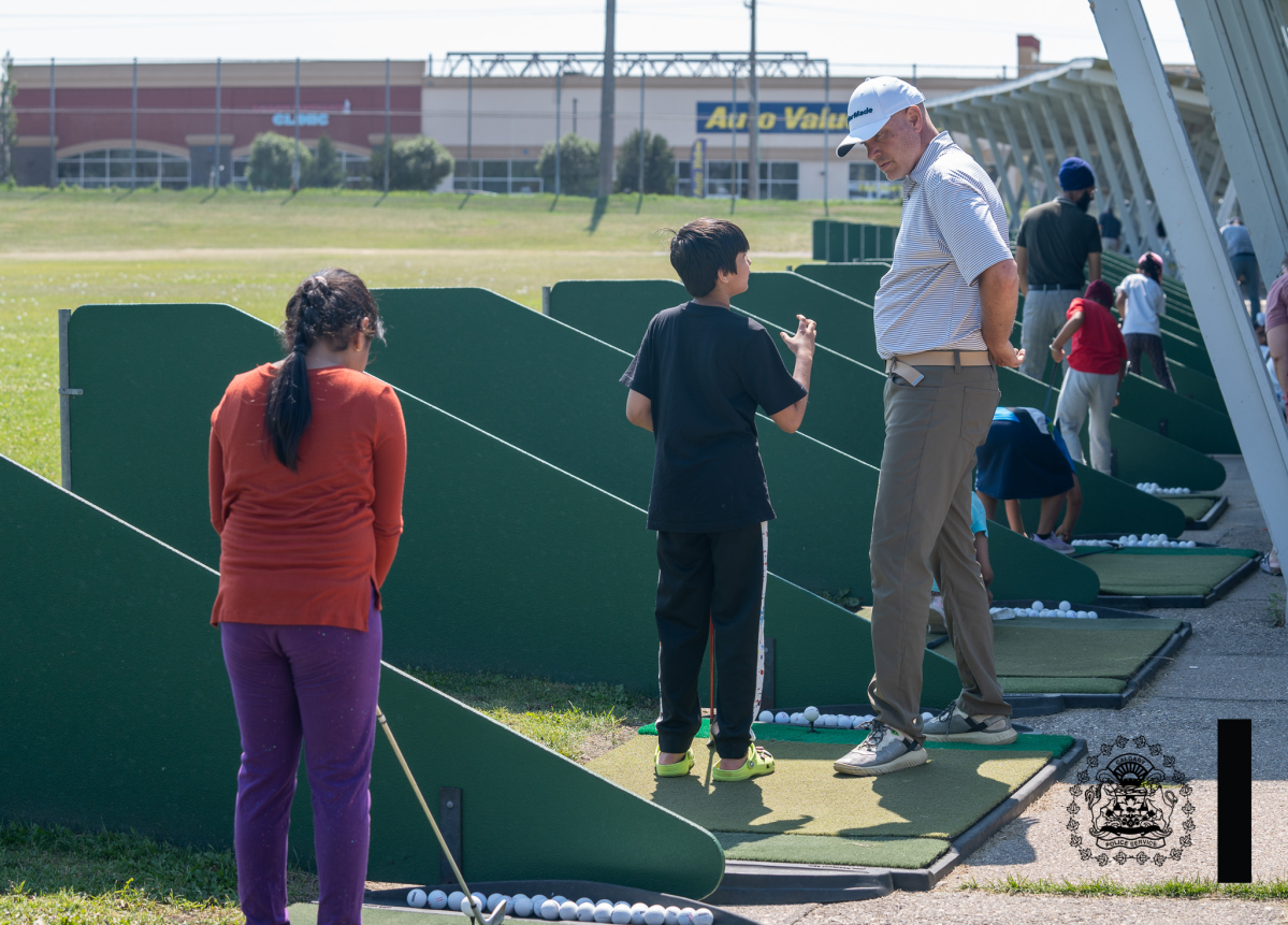 Golfing lesson at Operation Tee-Time in Calgary.