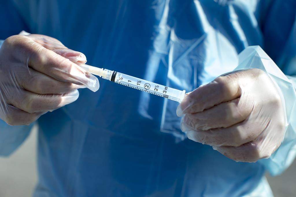 A needle and syringe.