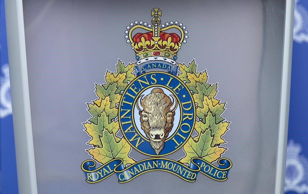 The RCMP logo is seen on a podium ahead of a news conference, in St. John's, Saturday, June 24, 2023. 