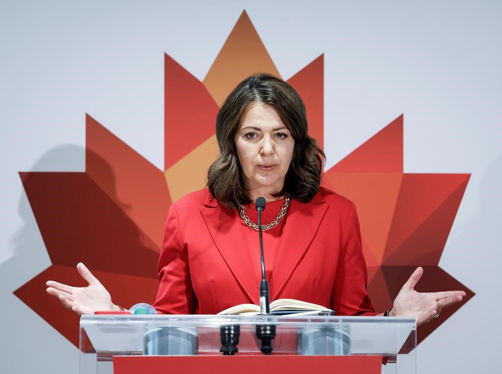 Alberta Premier Danielle Smith speaks to the media in Calgary, Monday, Sept. 18, 2023. Smith announced her government will consult with Albertans over the coming months with an eye to holding a referendum on whether to leave CPP and create a separate Alberta pension plan. Opposition finance critic Samir Kayande says as a last resort, an NDP government would cancel the plan at that late date, regardless of whether Albertans vote in favour of ditching the CPP in a referendum. THE CANADIAN PRESS/Jeff McIntosh