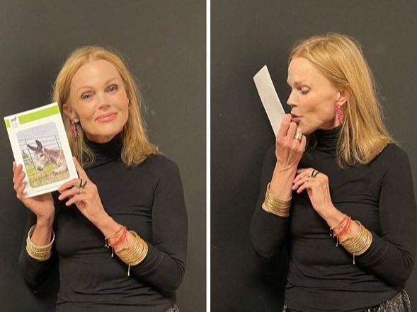 Go-Go's singer Belinda Carlisle with a photo of Duke the donkey.