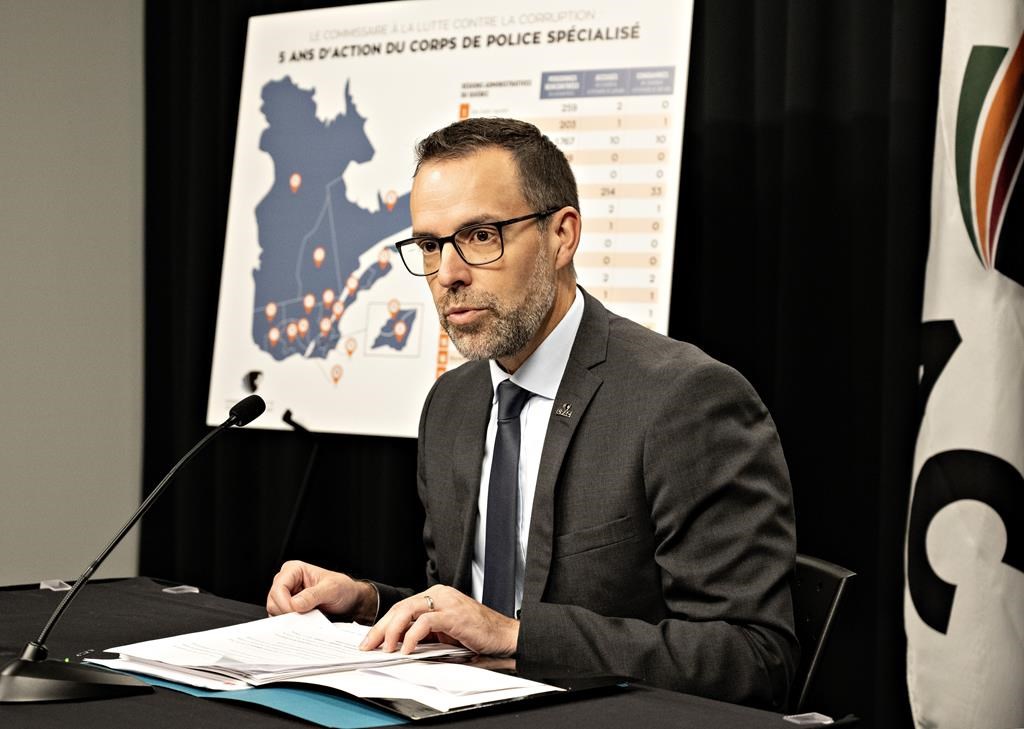 Quebec anti-corruption commissioner Frédérick Gaudreau unveils his annual report at a news conference, Tuesday, Oct. 24, 2023, in Quebec City. Quebec's anti-corruption force says that although the scandals that defined the province's construction industry in the last decade have subsided, corrupt activities have propagated on a smaller scale in several other sectors. 