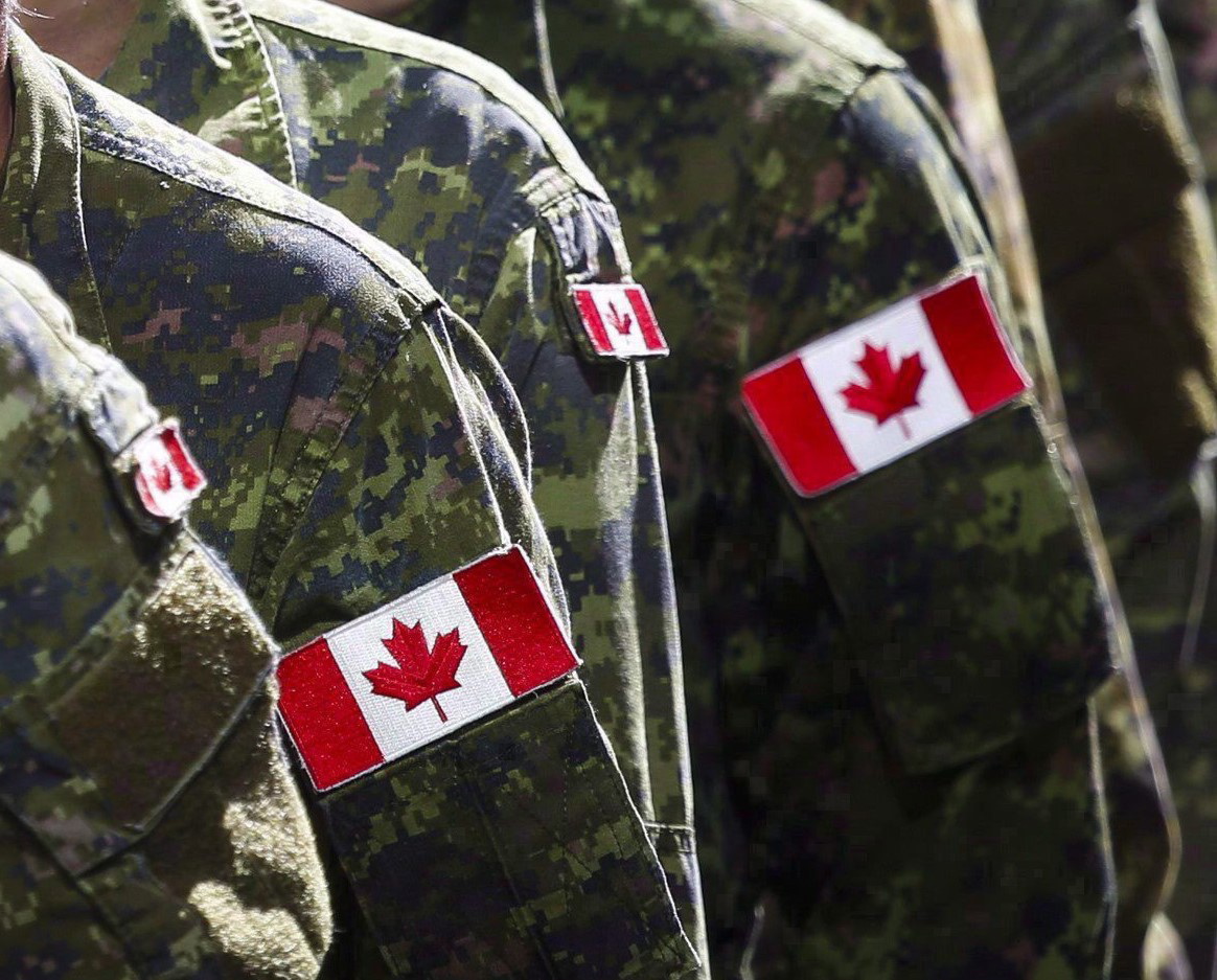 Members of the Canadian Armed Forces march in Calgary on July 8, 2016.