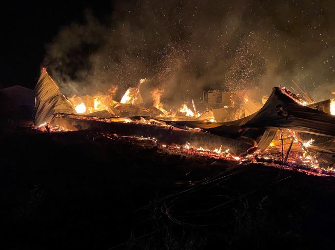 Manitoba RCMP are looking into the cause of this fire at a Gods Lake First Nation church last week.
