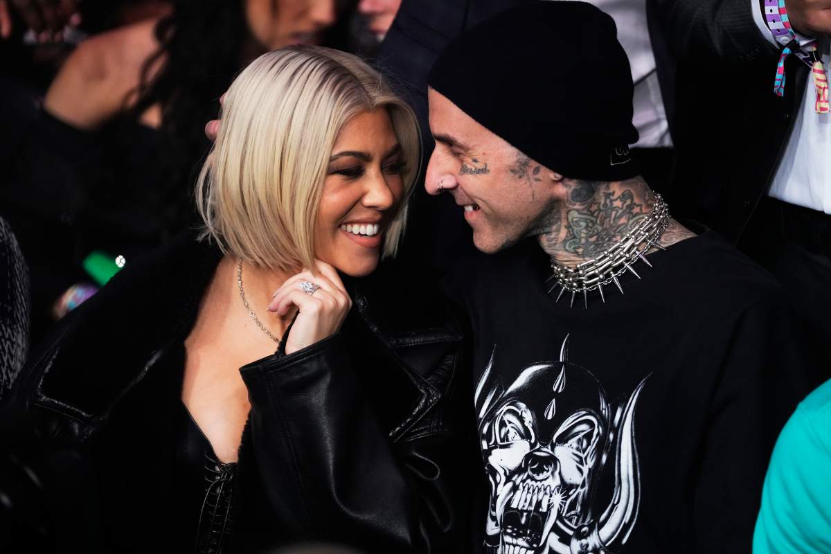 Kourtney Kardashian and Travis Barker attend the UFC 285 event at T-Mobile Arena on March 04, 2023 in Las Vegas, Nevada.