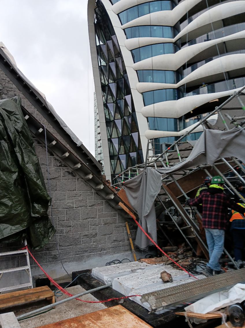 Photos from the scene show the aftermath of the scaffolding collapse.