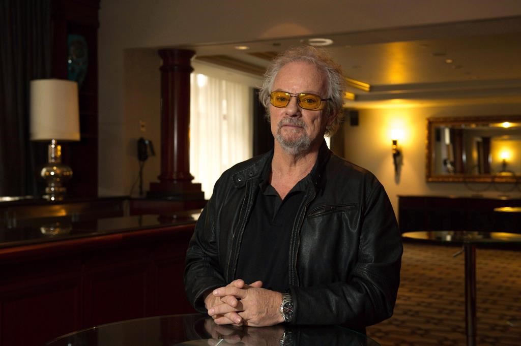 Myles Goodwyn poses for a portrait while promoting his memoir "Just Between You and Me," in Toronto, Friday, Nov. 25, 2016.