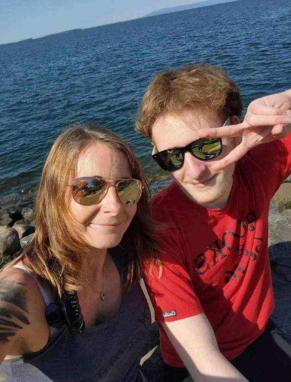 An Ontario-area mother says she initially felt angry at the man accused of selling a lethal substance to her son who later ingested it and died by suicide almost two hours after he called her on the phone one last time. Kim Prosser poses for a selfie with her son Ashtyn Prosser in an undated handout photo.