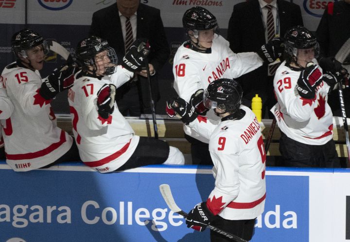 Canada's Nate Danielson (9) celebrates his goal against Finland with teammates during first period hockey action at the IIHF World Junior Hockey Championship in Gothenburg, Sweden on Tuesday, Dec 26, 2023.