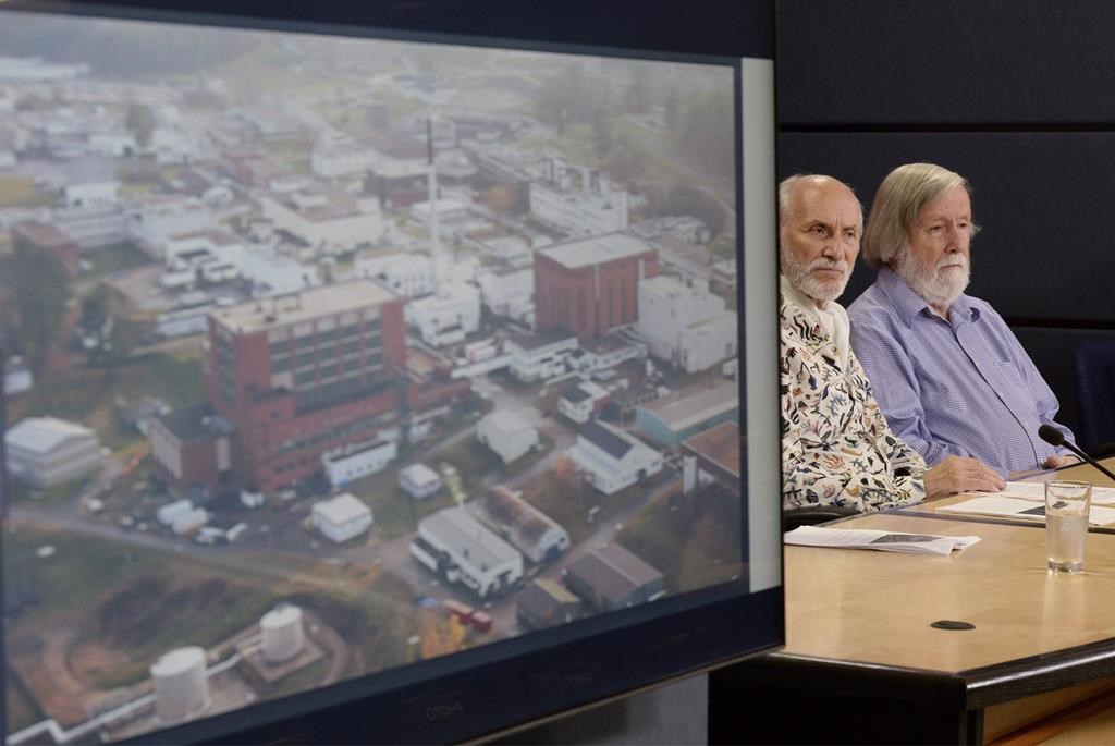 An image of the Chalk River nuclear complex is displayed during a news conference with Gilles Provost and President of the Canadian Coalition for Nuclear Responsibility Gordon Edwards in Ottawa on August 21, 2018. Several First Nations and environment advocates are expressing disappointment after Canada’s nuclear regulator greenlighted earlier this week a proposed nuclear waste facility near the Ottawa River. THE CANADIAN PRESS/Adrian Wyld.