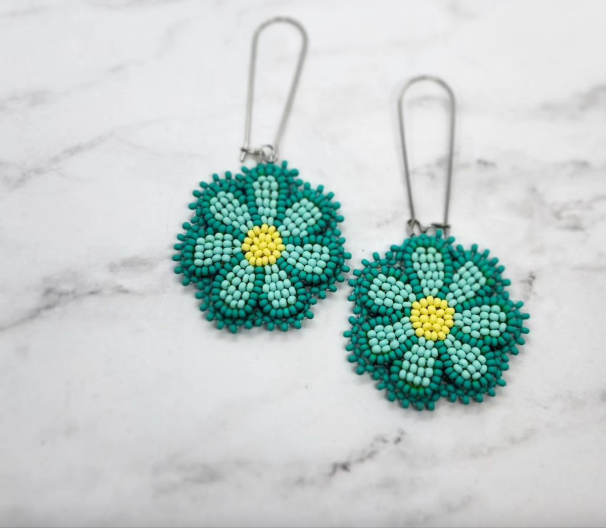 Local artist created earrings, Beading Neechis