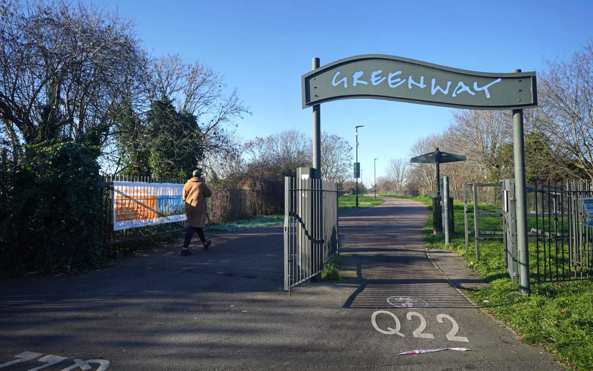 A Greenway sign.