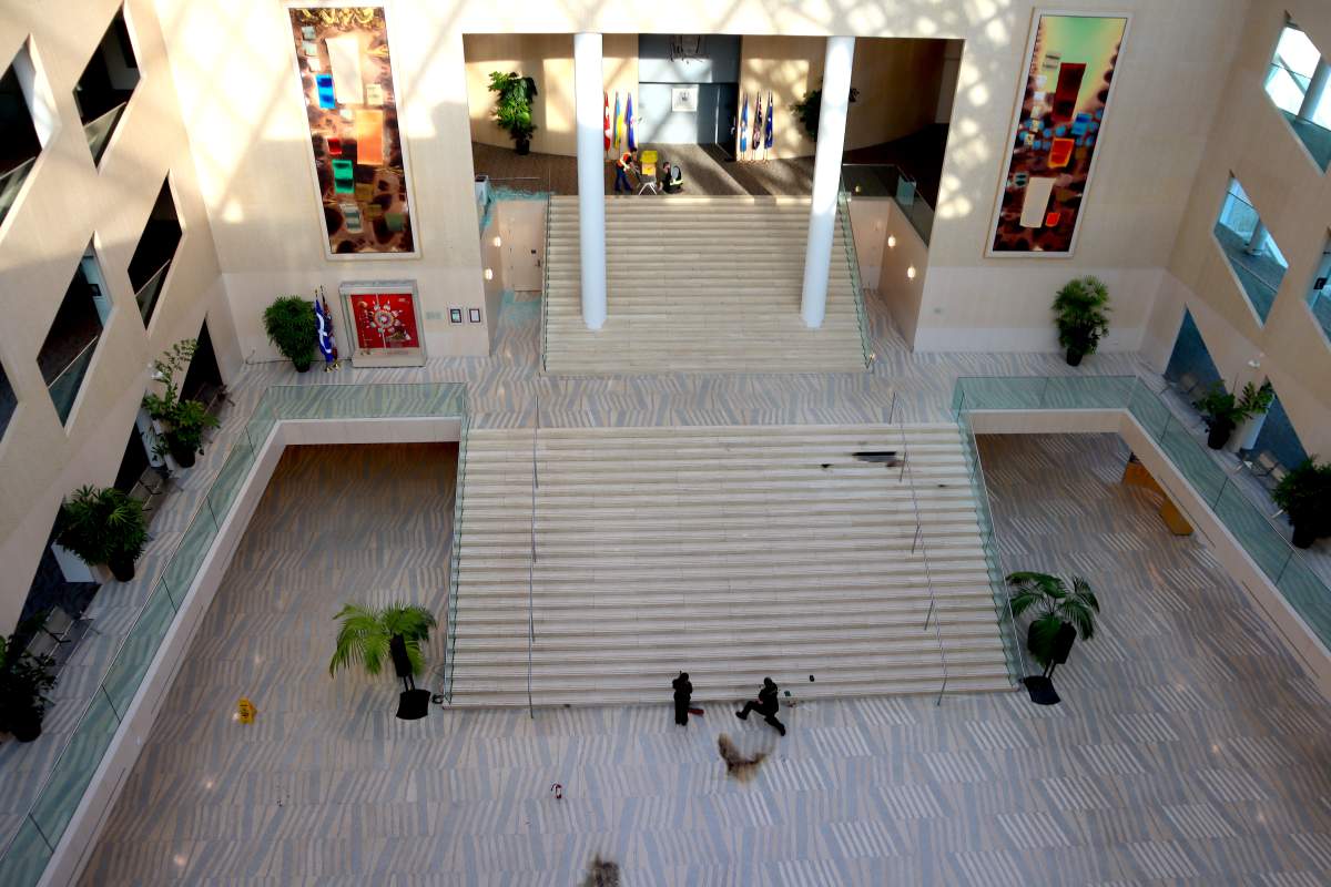 Restoration crews work to repair damage inside Edmonton City Hall Wednesday, Jan. 24, 2024, one day after a shooting inside the building.