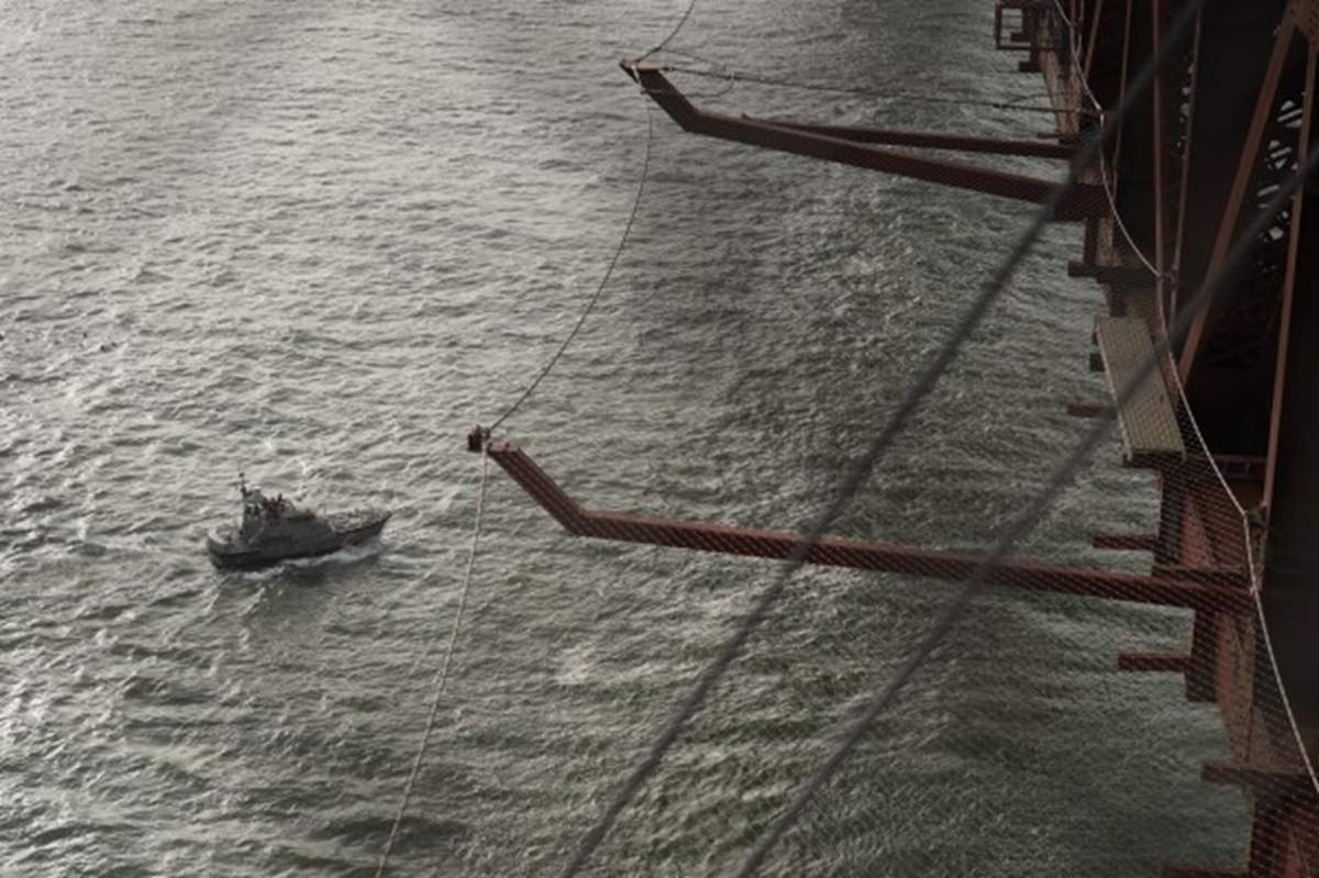 A boat is seen under the suicide nets.