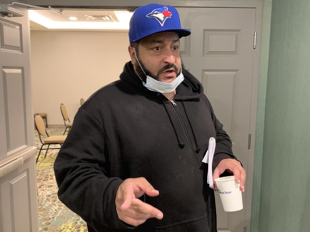 Adam LeRue, 42, comes out of a Nova Scotia Police Review Board hearing in Halifax on July 15, 2020. A Police Review Board has ruled that a Halifax officer who arrested a couple who had stopped in a city park after hours should be suspended without pay for two weeks. THE CANADIAN PRESS/Michael Tutton.