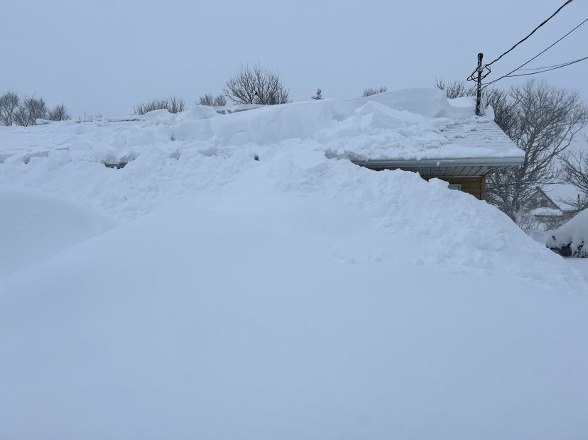 Pam Leader’s home in Glace Bay, N.S. in Cape Breton is barely visible after a relentless multi-day snow storm dumped more than 100 cm of snow in parts of Nova Scotia.