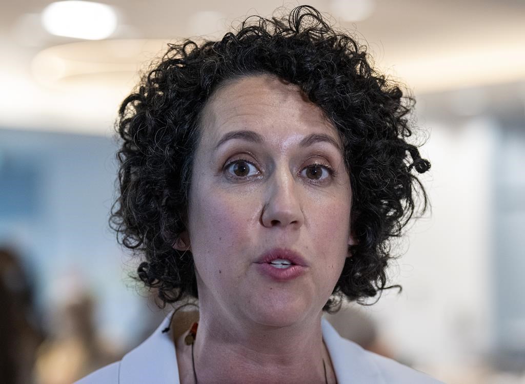 Nova Scotia’s third-party NDP has tabled a bill in the legislature that would ban the use of replacement workers during a strike. NDP Leader Claudia Chender talks with reporters at the party's convention in Dartmouth, N.S., on Saturday, June 25, 2022. THE CANADIAN PRESS/Andrew Vaughan.