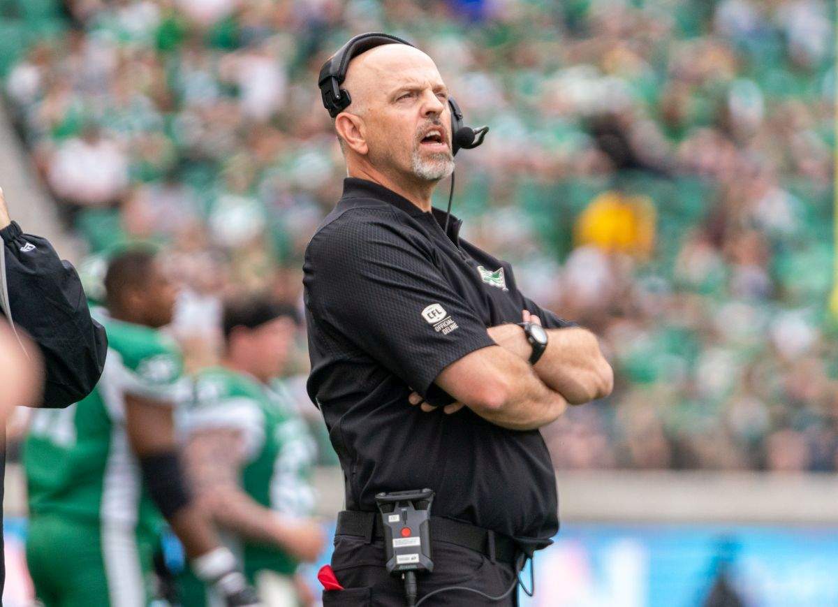 Saskatchewan Roughriders head coach Craig Dickenson watches the action during first half CFL football against Hamilton Tiger-Cats in Regina, on Saturday, June 11, 2022.