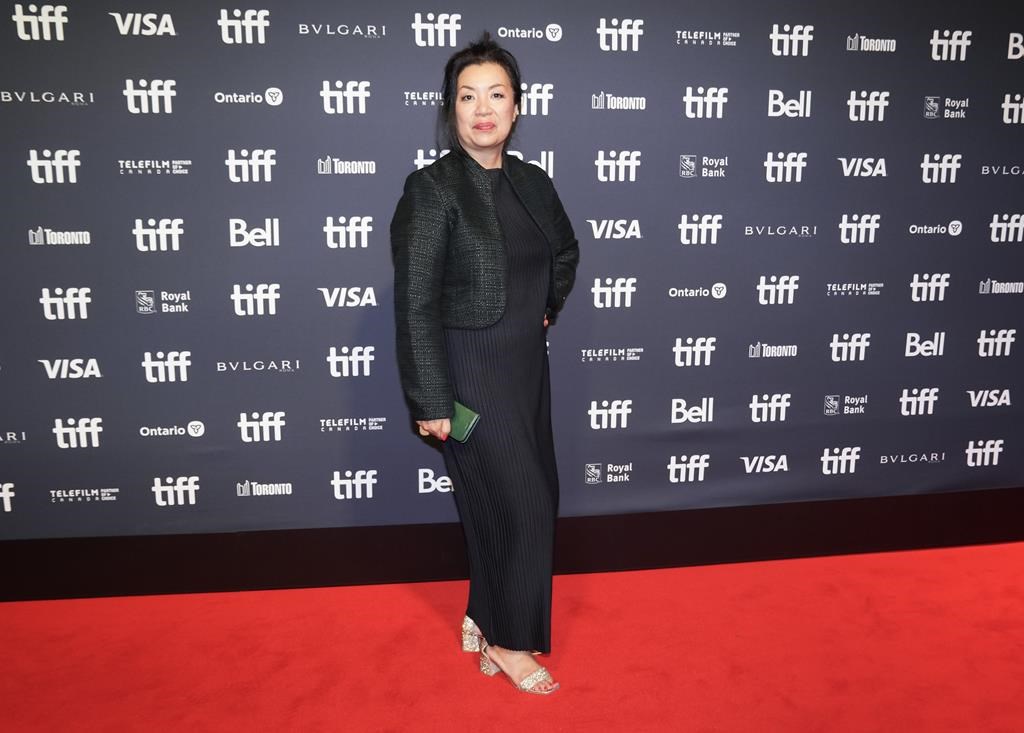 Tens of millions of dollars are allocated to arts festivals in this year's federal budget, which recipients say is a welcome infusion of cash for the beleaguered sector. TIFF's Chief Programming Officer, Anita Lee poses for a photograph on the red carpet for the new movie "The Boy And The Heron" at the Toronto International Film Festival in Toronto on Thursday, Sept. 7, 2023. THE CANADIAN PRESS/Nathan Denette.