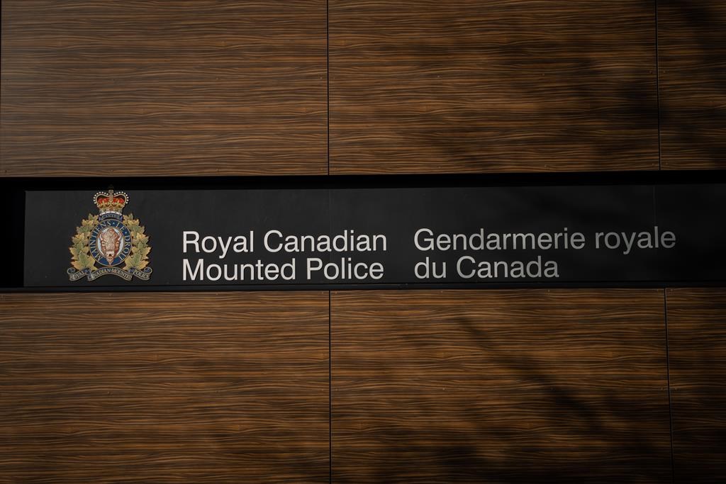 The B.C. RCMP Divisional Headquarters is seen, in Surrey, B.C., on Thursday, Jan. 11, 2024. The first police officer to enter a room where a woman was being held hostage in 2019 has told a B.C. coroner's inquest that he saw her lying on a bed on top of her captor, who was holding a knife to her throat with a gun in his other hand. THE CANADIAN PRESS/Ethan Cairns.