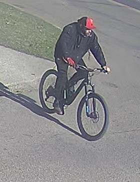 The Edmonton Police Service is searching for this person of interest as they investigate a fire that destroyed Hangar 11 on April 22, 2024.