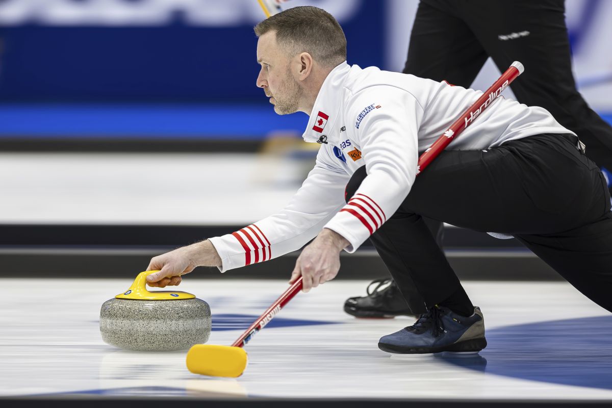 Canada's skip Brad Gushue delivers a stone against the Czech Republic at the men's Curling World Championships in Schaffhausen, Switzerland, Saturday, March 30, 2024.