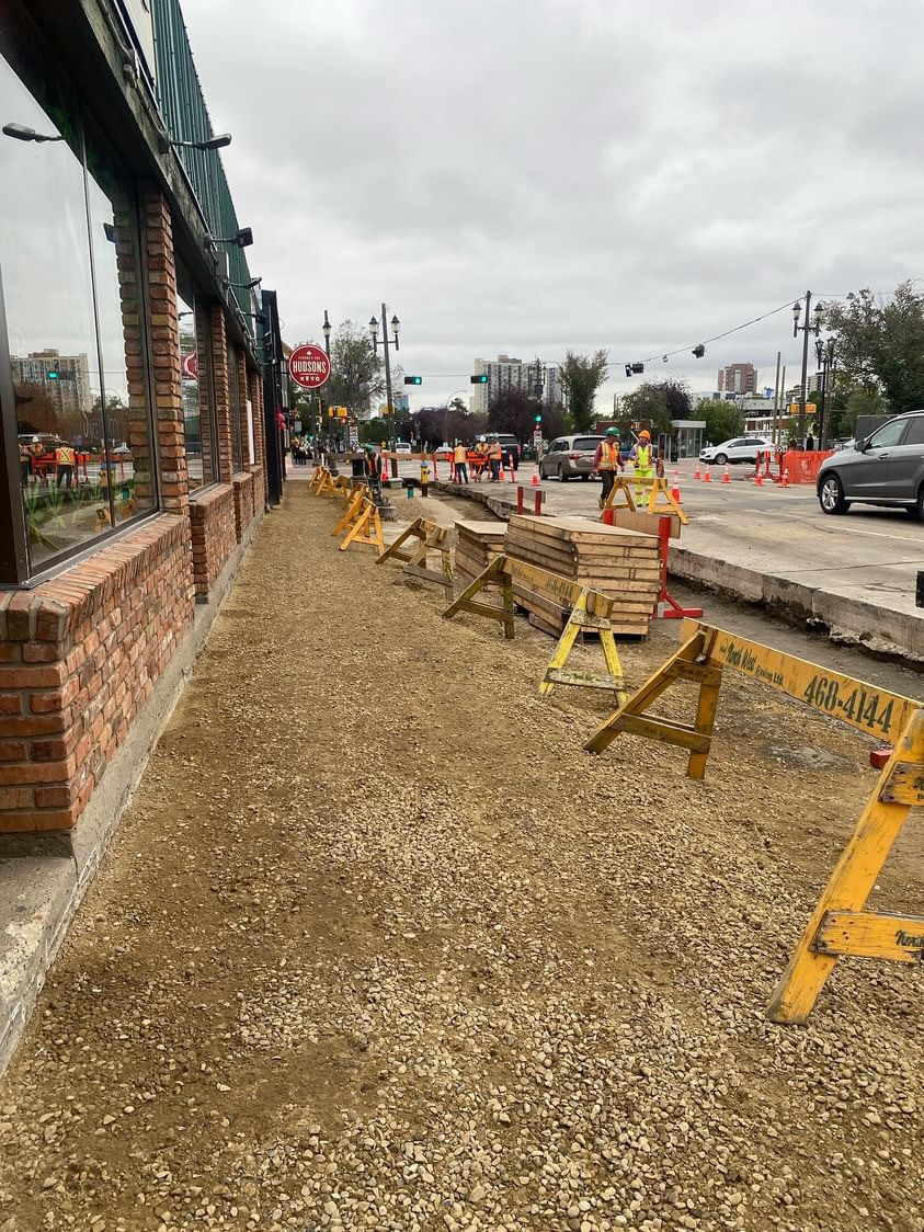 Sidewalk construction along Hudsons Canada's Pub on Whyte Avenue.