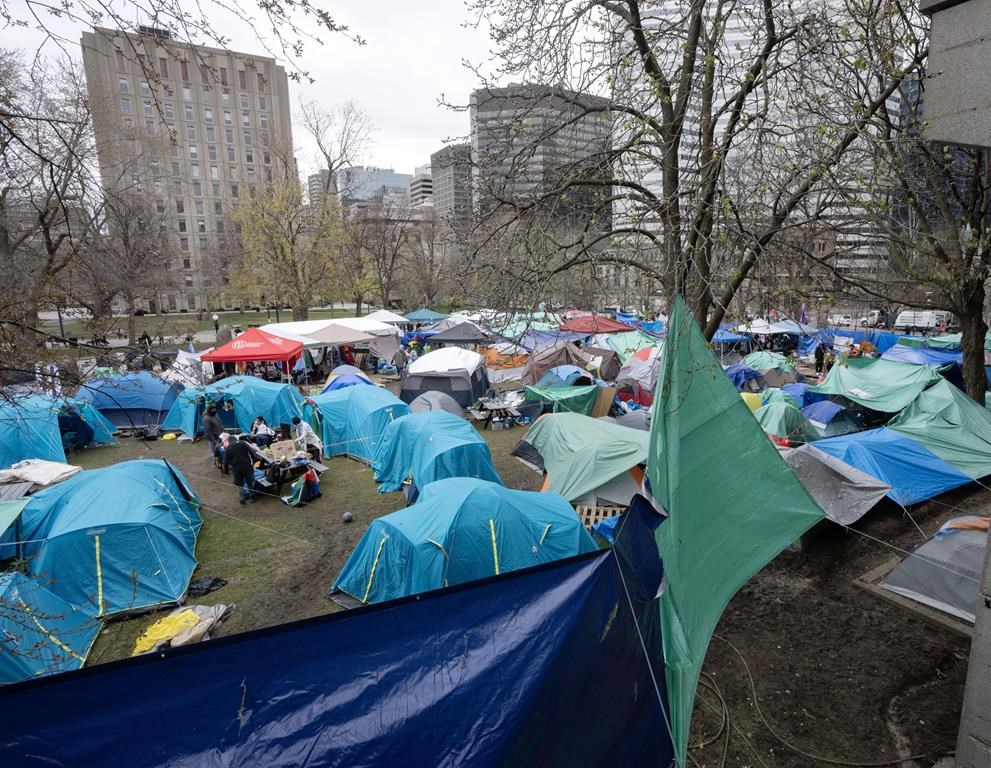 Pro-Palestinian activists at their encampment on the McGill University campus in Montreal, Wednesday, May 1, 2024.