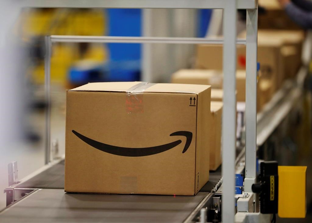 Boxes on a conveyor belt during a tour of the Amazon fulfillment centre in Aurora, Colo., on May 3, 2018. 