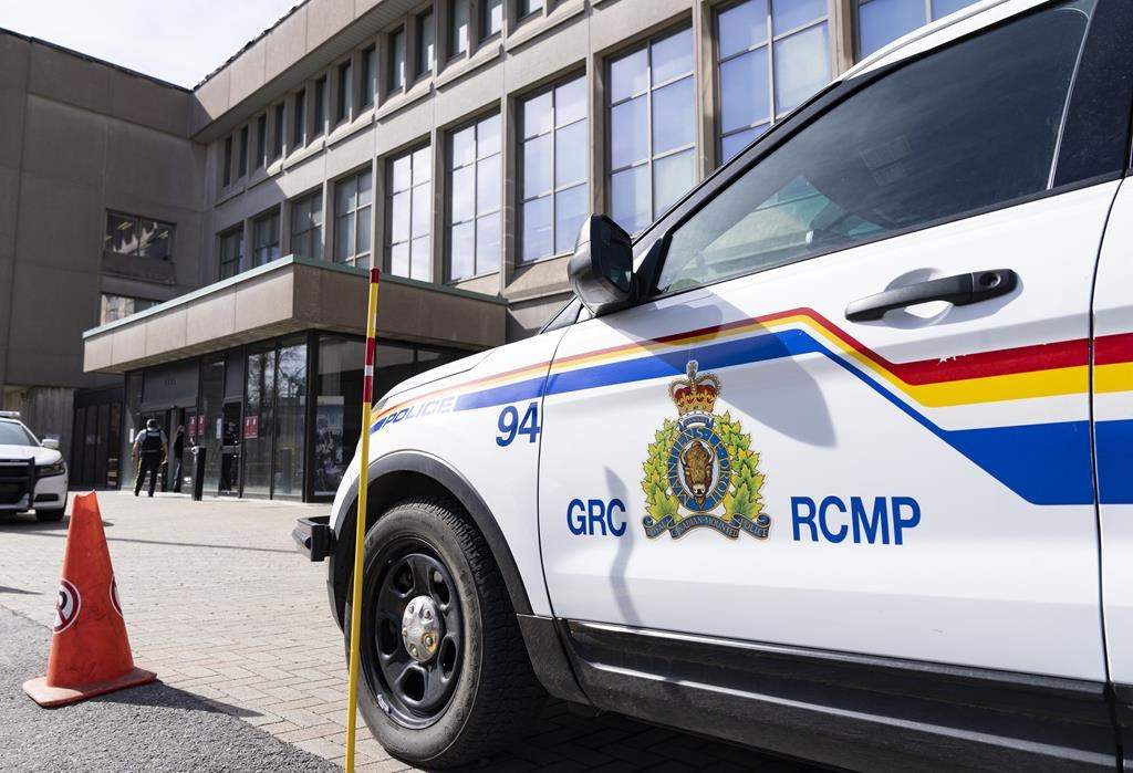 Mounties are looking for a driver involved in a hit-and-run in Airdrie that happened at noon on Friday. RCMP vehicle signage is shown in Montreal, Thursday, March 7, 2024. THE CANADIAN PRESS/Christinne Muschi.