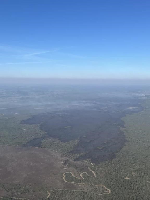 Residents of Fort McMurray and the nearby community of Saprae Creek remain on an evacuation alert as an out-of-control wildfire burns south of the city, but municipal officials say in their latest update that winds on Saturday appear to be pushing the flames further south. A massive swathe of burned forest is seen as a wildfire designated MWF017 by the Alberta Wildfire Service, top right, continues to burn near Ft. McMurray, Alta., in a Saturday, May 11, 2024, handout photo. THE CANADIAN PRESS/HO-Alberta Wildfire Service, *MANDATORY CREDIT*.