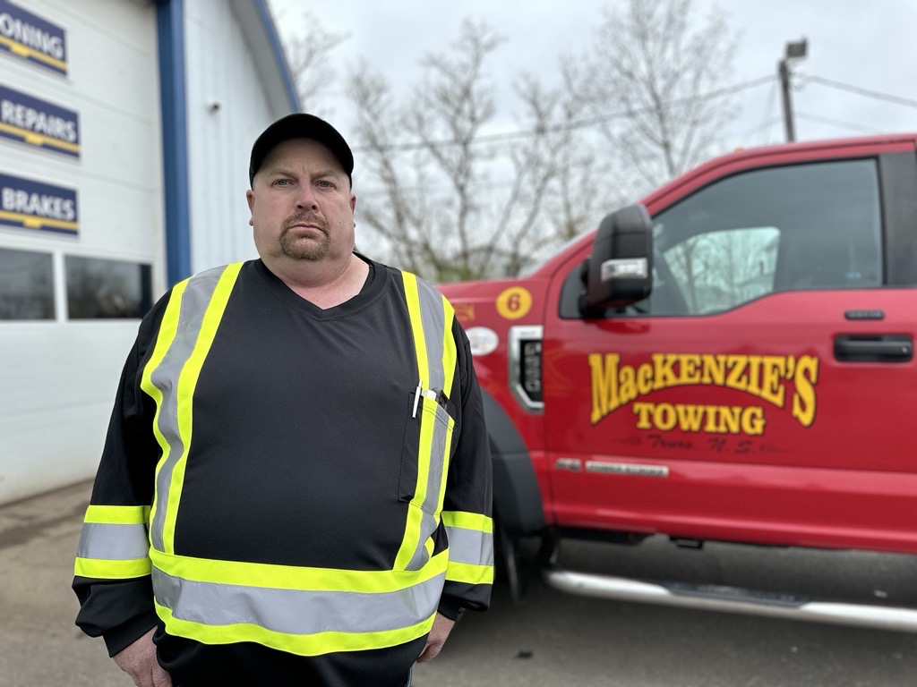 Jason Beaton's tow truck was struck on Highway 102 in Truro, N.S. while he was assisting a driver.